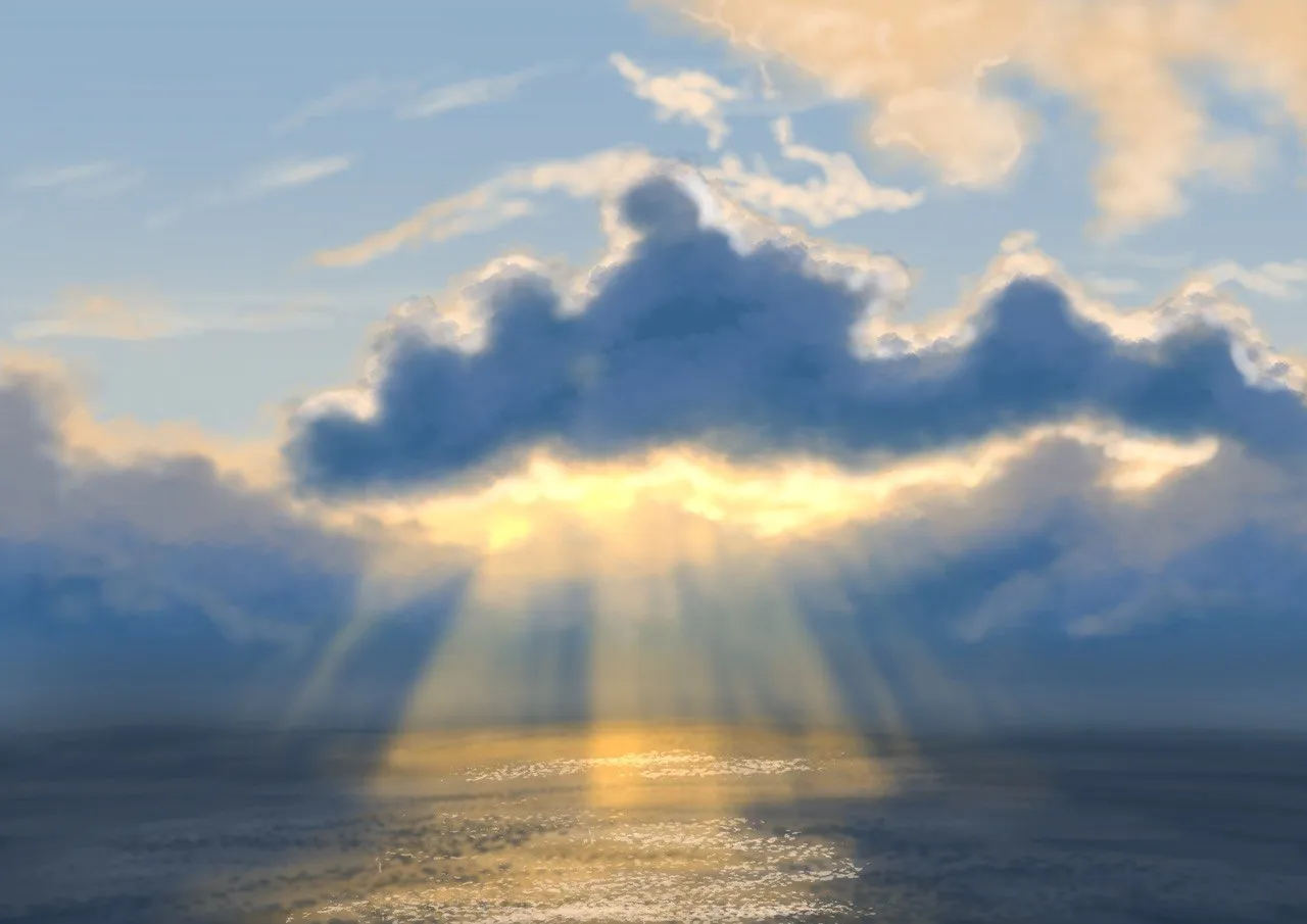 Rays of sunlight coming down through a bank of dark blue clouds onto the sea.